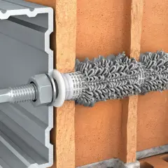 Przekrój pokazujący kotwy chemiczne mocujące profil aluminiowy do cegły.