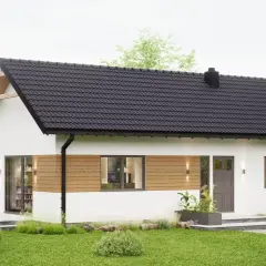 Nowoczesny, biały dom z drewnianymi akcentami i czarnym dachem. Idealny dla marzycieli o własnym kącie, taki dom za 50 tys pod klucz to realna szansa.